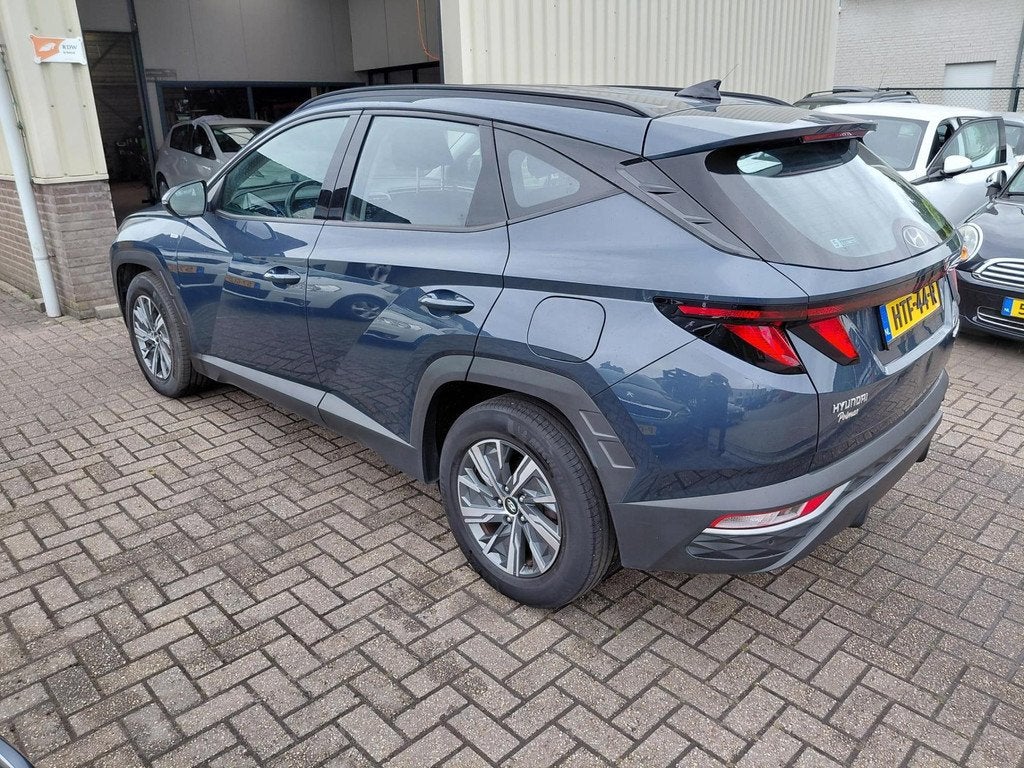 Hyundai Tucson Hybride Automaat, Auto's, 136 pk, Gebruikt, Blauw, 1650 kg