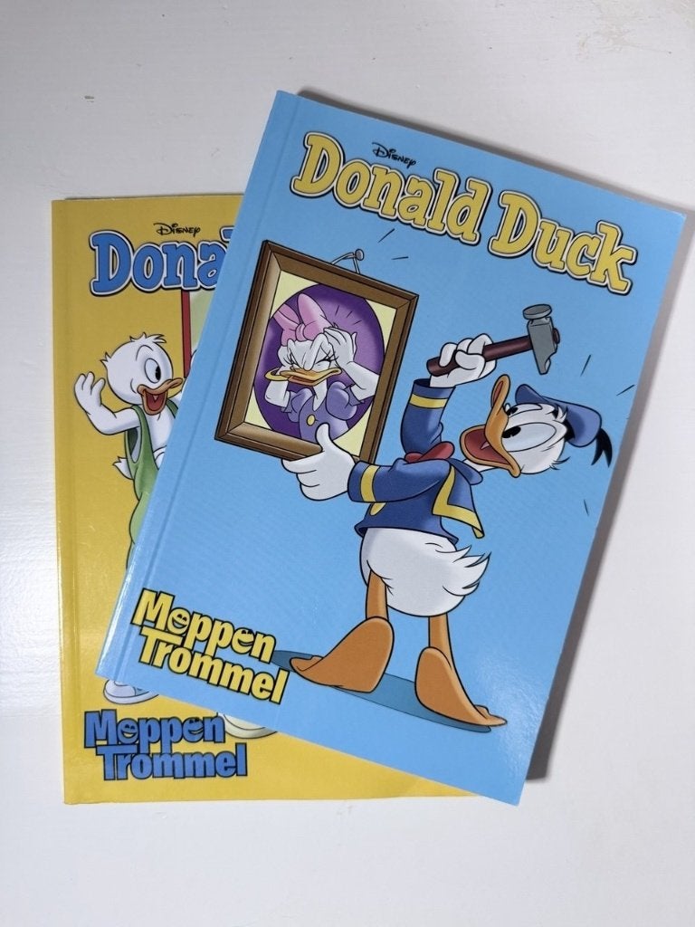 Donald Duck Moppentrommel – 2 boekjes vol moppen & raadsels, Boeken, Ophalen of Verzenden, Gelezen, Fictie algemeen