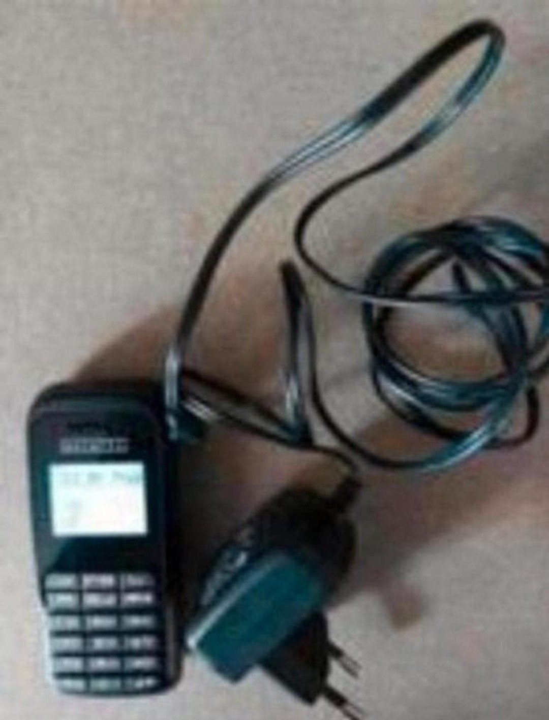 Mobiele telefoon met oplader. In PERFECTE STAAT, Telecommunicatie, Ophalen of Verzenden, Zo goed als nieuw, Zwart