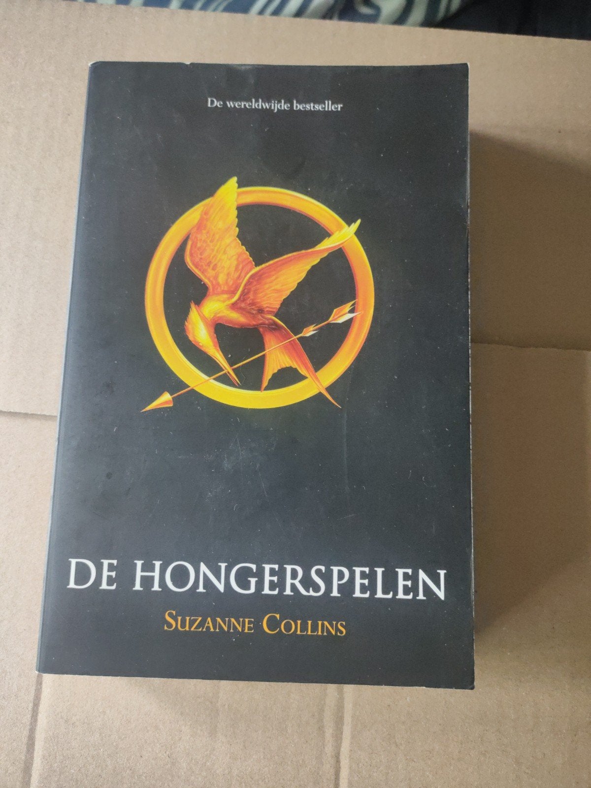 De hongerspelen Suzanne Collins, Boeken, Ophalen of Verzenden, Zo goed als nieuw, Suzanne Collins