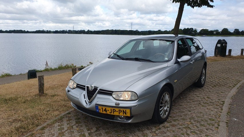Alfa Romeo 156 2.4 JTD Sportwagon 2002 Grijs, Auto's, Alfa Romeo, Voorwielaandrijving, 15 km/l, Leder en Stof, Origineel Nederlands