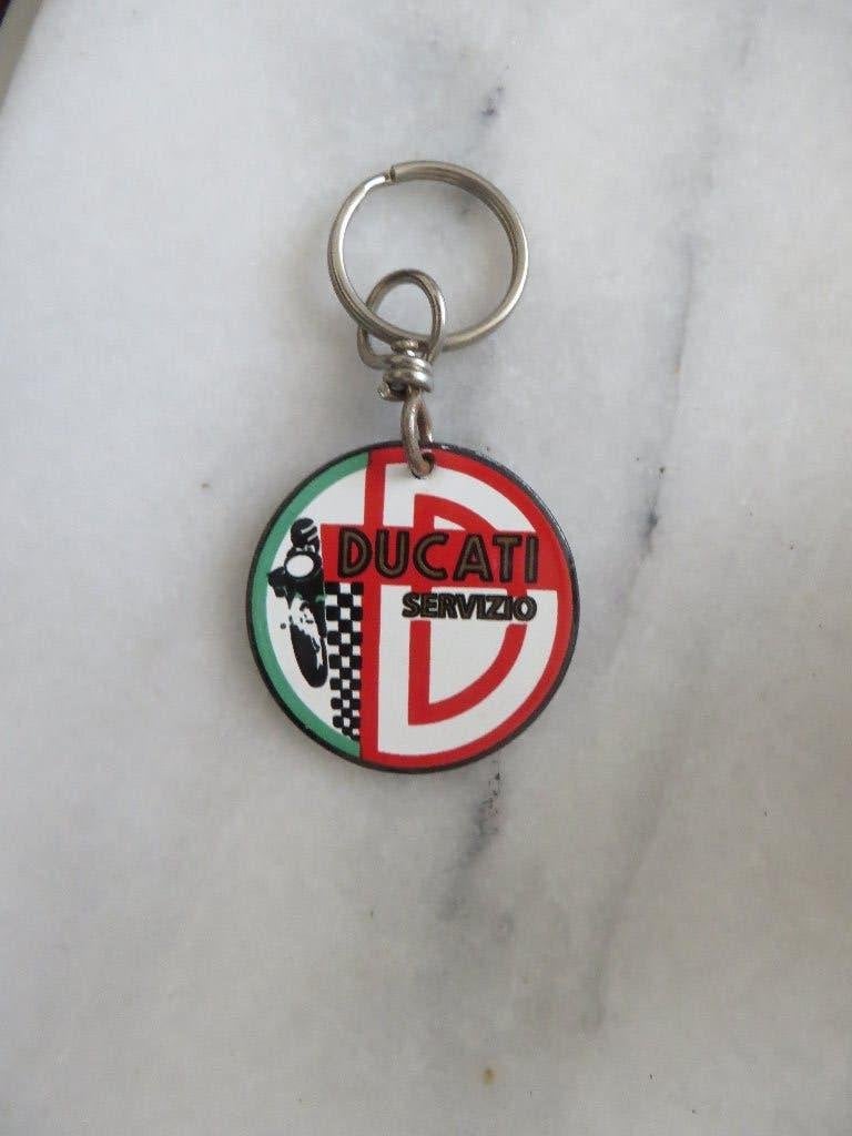Sleutelhanger, reclame voor Ducati motoren, emaille, Ophalen of Verzenden, Gebruikt, Gebruiksvoorwerp