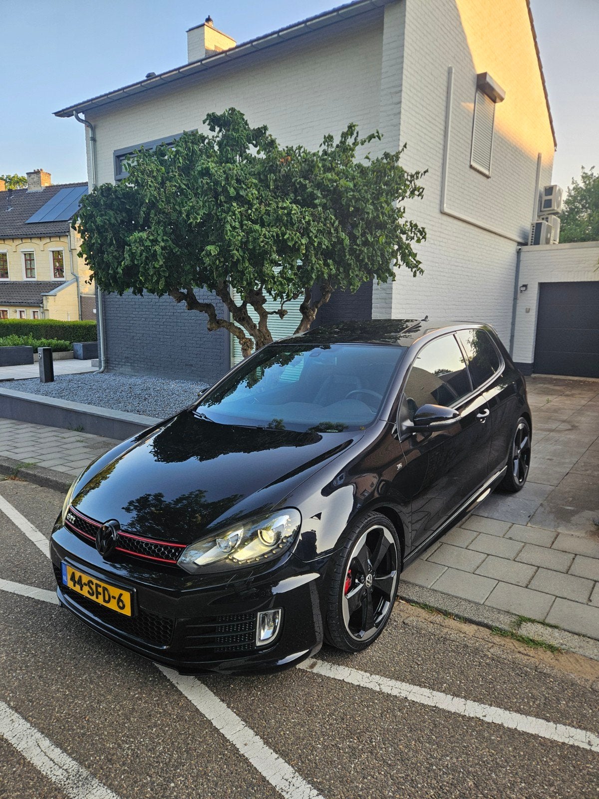 Volkswagen Golf 2.0 GTI 310PK 2011 ED35 Zwart, Auto's, Voorwielaandrijving, Zwart, 4 cilinders, Leder en Stof