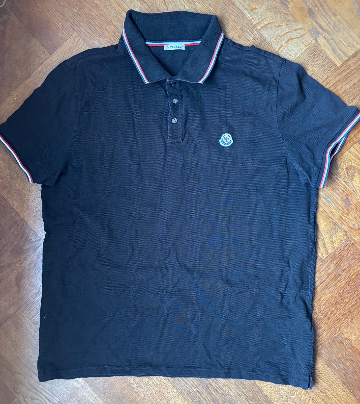 Moncler polo, Ophalen of Verzenden, Zo goed als nieuw, Maat 56/58 (XL), Zwart