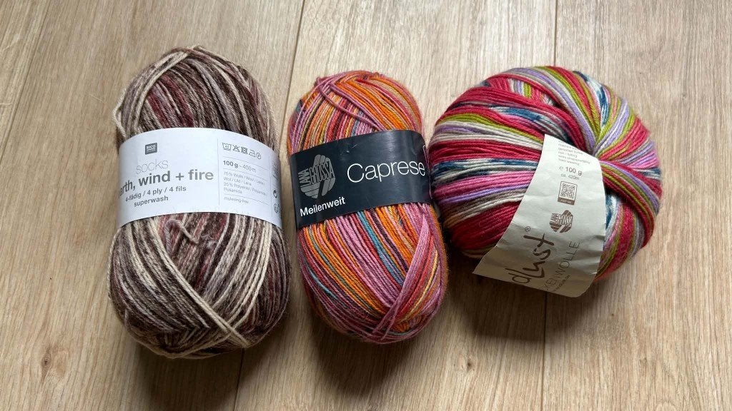 Drie bollen sokkenwol, Hobby en Vrije tijd, Verzenden, Nieuw, Breien of Haken, Wol of Garen