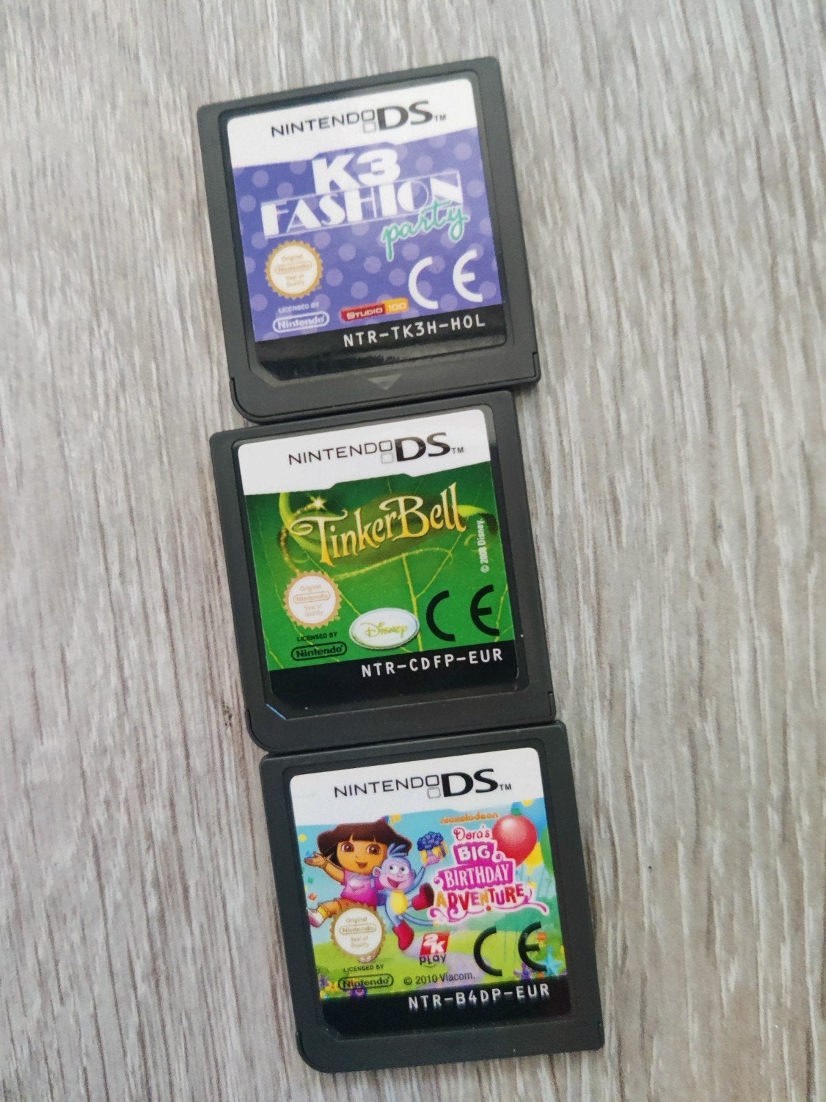 Nintendo DS Spellen: TinkerBell, Dora, K3 Fashion Party, Spelcomputers en Games, Avontuur en Actie, Gebruikt, 1 speler, Ophalen of Verzenden