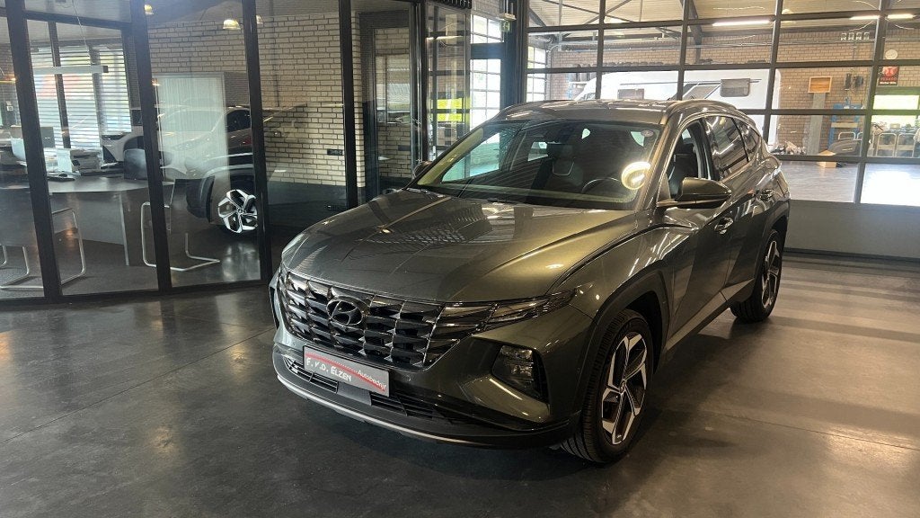Hyundai TUCSON 1.6 T-GDI HEV Premium 230 Pk Automaat 1650 kg, Auto's, Gebruikt, Huisgarantie, 4 cilinders, Met garantie (alle)