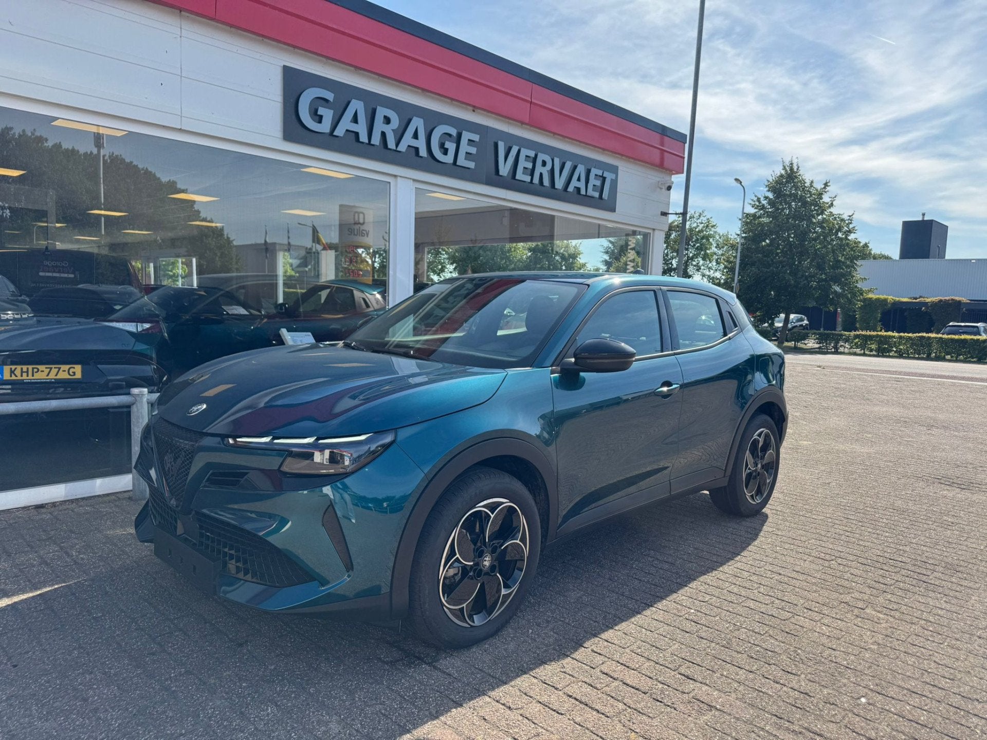 Alfa Romeo Junior Elettrica 54 kWh (bj 2025, automaat), Auto's, Alfa Romeo, Stof, Gebruikt, Zwart, Blauw
