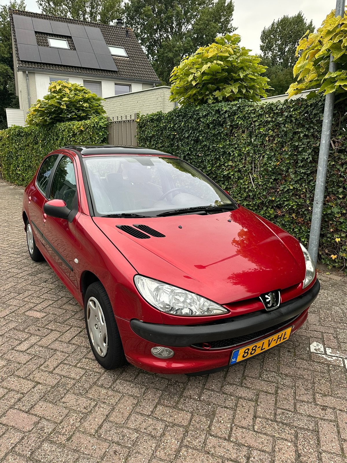 Peugeot 206 1.4 2003 Rood - NAP - Panoramadak - 1e eigenaar, Auto's, Voorwielaandrijving, Stof, 31 €/maand, 4 cilinders