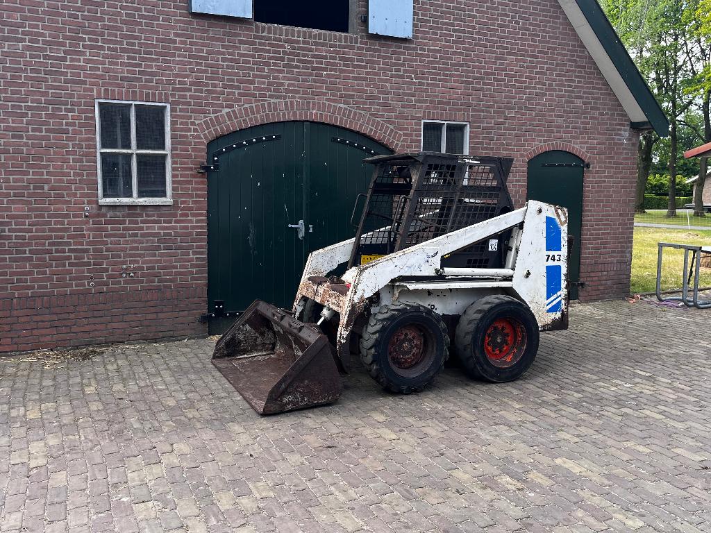 Bobcat 743, schranklader met bak(marge), Ophalen, Wiellader of Shovel