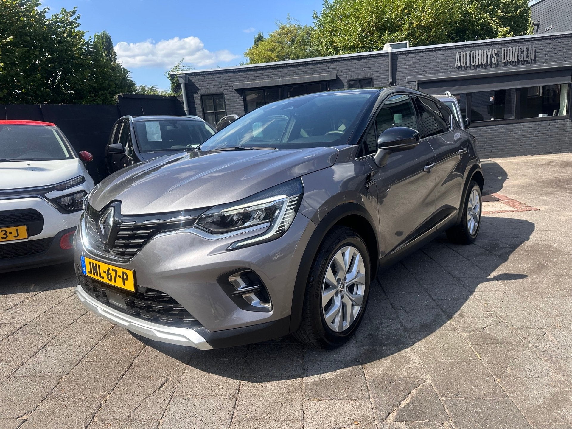 Renault Captur 1.0 TCe Intens|91pk|Navi|Clima|Panodak, Auto's, Voorwielaandrijving, Gebruikt, Zwart, Leder en Stof