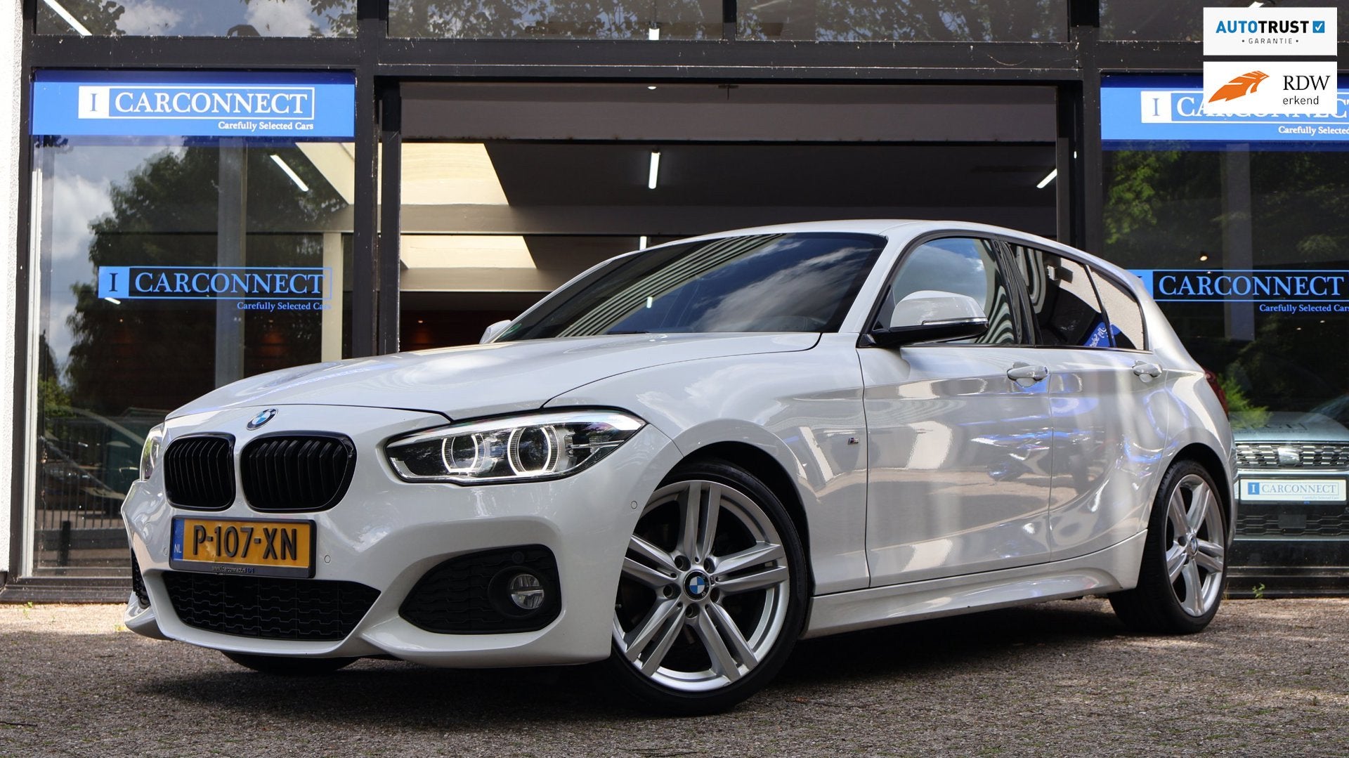 BMW 1-serie 120i Edition M Sport Shadow High Executive|PDC|L, Auto's, BMW, Achterwielaandrijving, Gebruikt, 4 cilinders, Wit