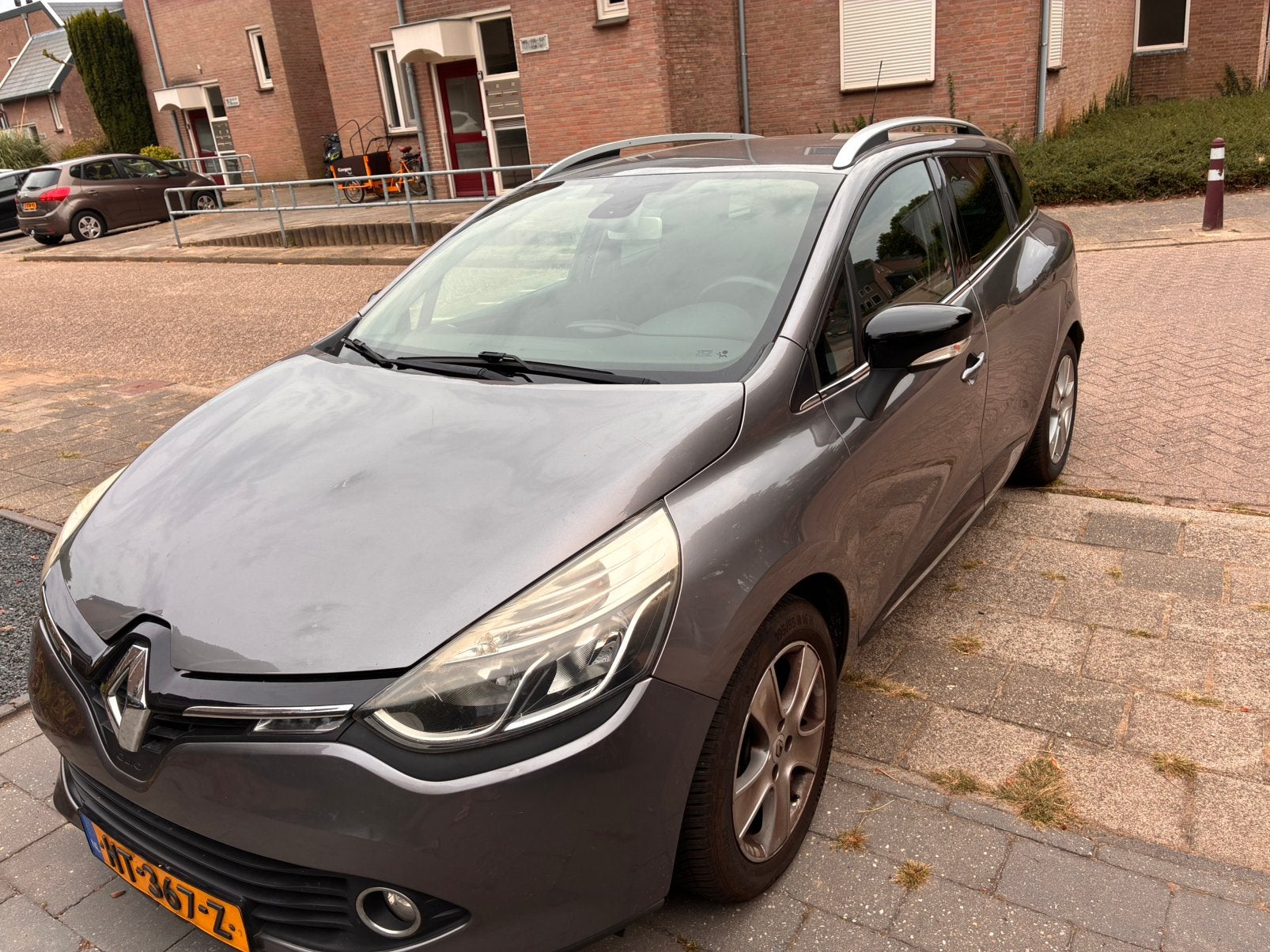 Renault Clio 1.2 TCE 88KW Estate EDC 2015 Grijs, Auto's, Renault, 4 cilinders, 49 €/maand, 19 km/l, Particulier