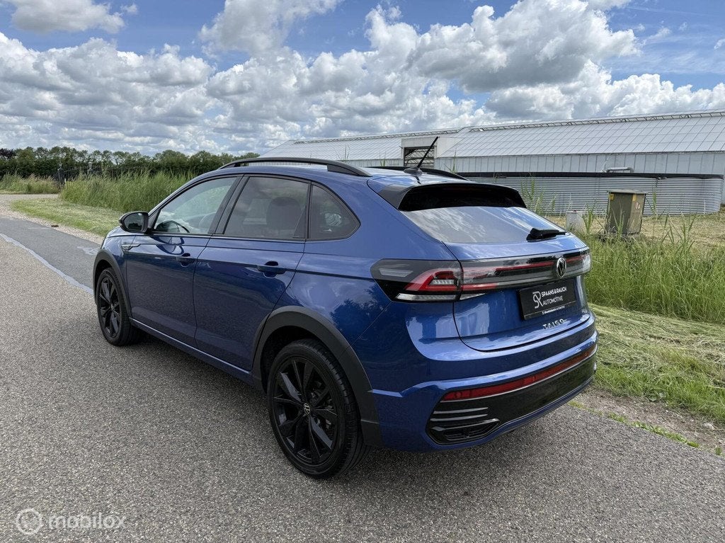 Volkswagen Taigo 1.0 TSI R-Line Business / CarPlay / Camera, Automatische klimaatregeling, Gebruikt, Zwart, Blauw