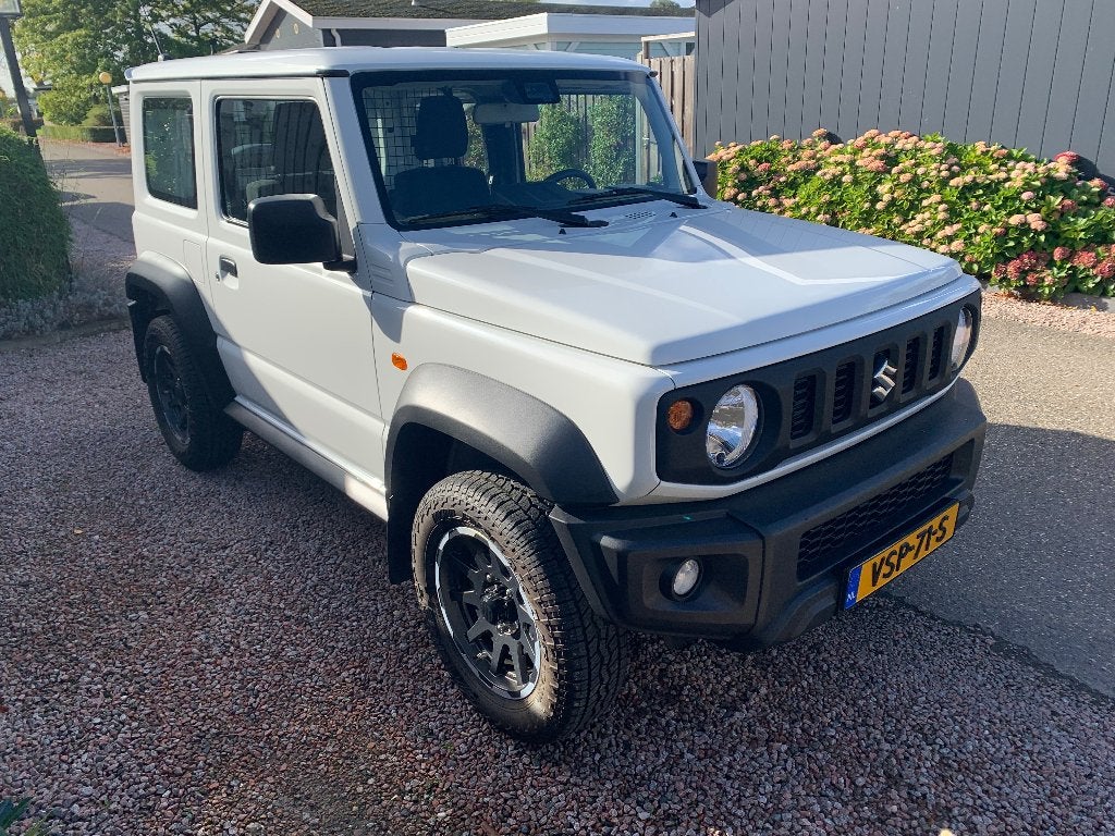 Suzuki Jimny 1.5L VVT 102pk Allgrip Pro 2022 Tarakku versie, Auto's, Bestelauto's, 13 km/l, Stof, 4 cilinders, Wit