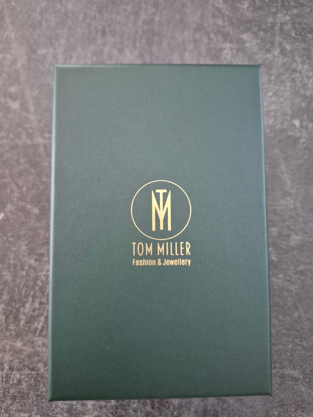 horloge. merk: tom miller.  kleur: goud-zilver., Staal, Polshorloge, Zo goed als nieuw, Zilver