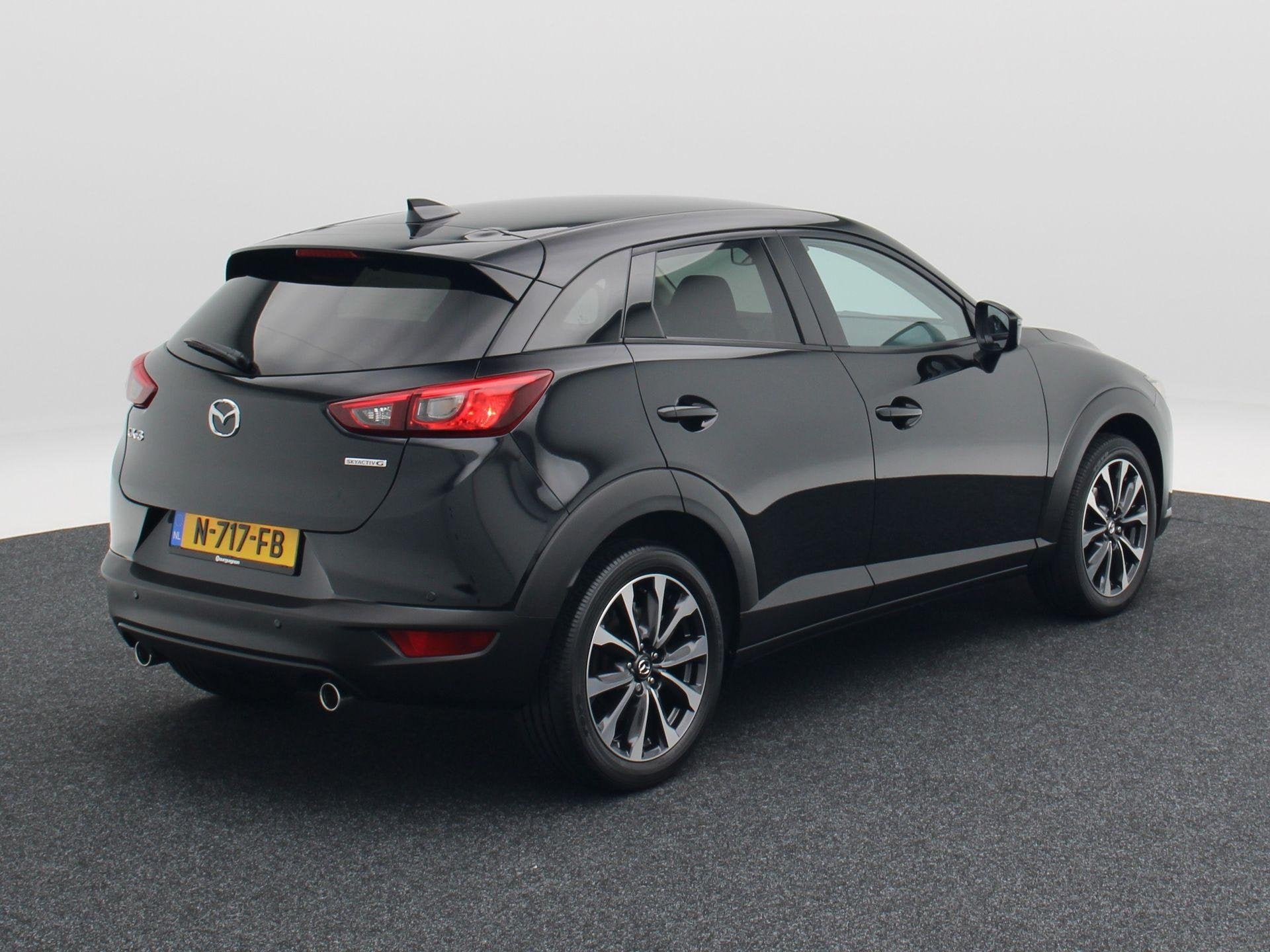 Mazda CX-3 2.0 SkyActiv-G 121 Sportive | Navigatie | Stoelve, Auto's, 4 cilinders, Zwart, Origineel Nederlands, Handgeschakeld