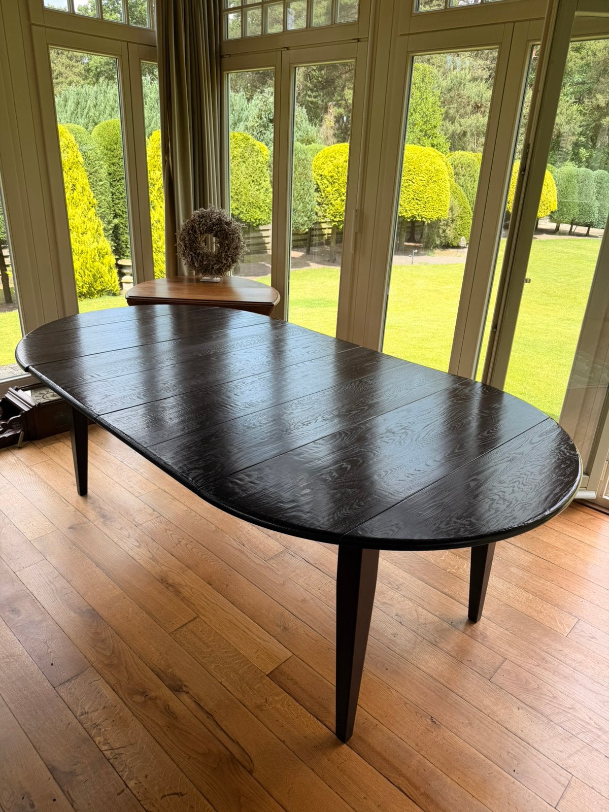 Houten uitschuifbare tafel (ovaal en rond), Ophalen
