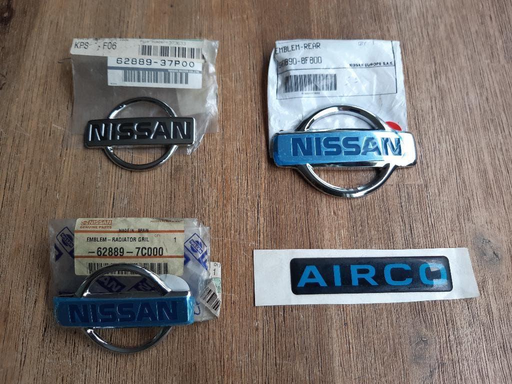 Diverse - NIEUWE & ORIGINELE - Logo's van NISSAN - Emblemen, Auto diversen, Auto-accessoires, Verzenden, Nieuw