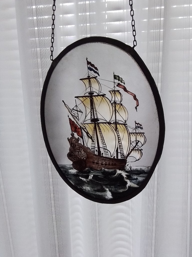 Glas in lood raamhanger, Ophalen