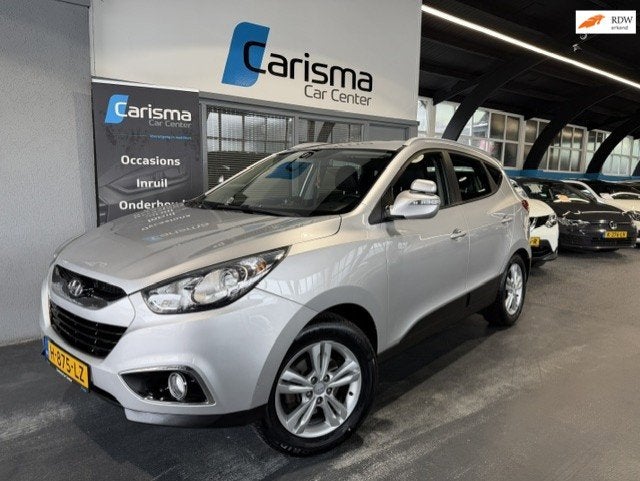 Hyundai Ix35 2.0i 4WD Active Aut.|Leder|Airco|NW APK, Auto's, Automaat, Gebruikt, Zwart, 4 cilinders