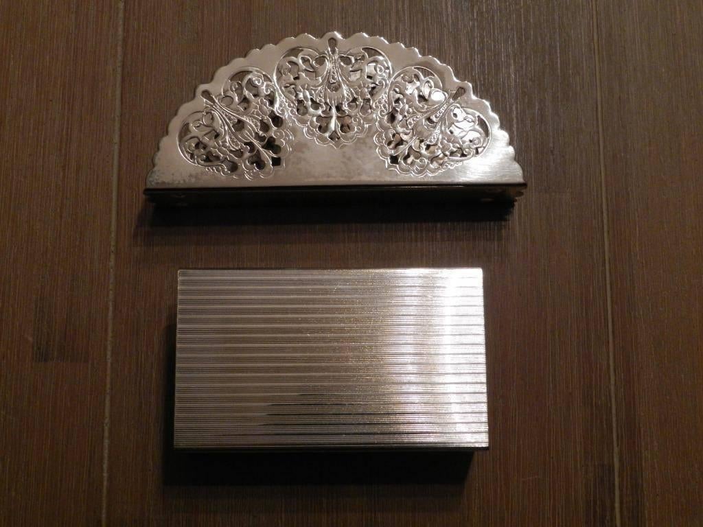 2 zilveren / zilverkleurige servethouders, Overige typen, Zilver, Ophalen of Verzenden, Zo goed als nieuw