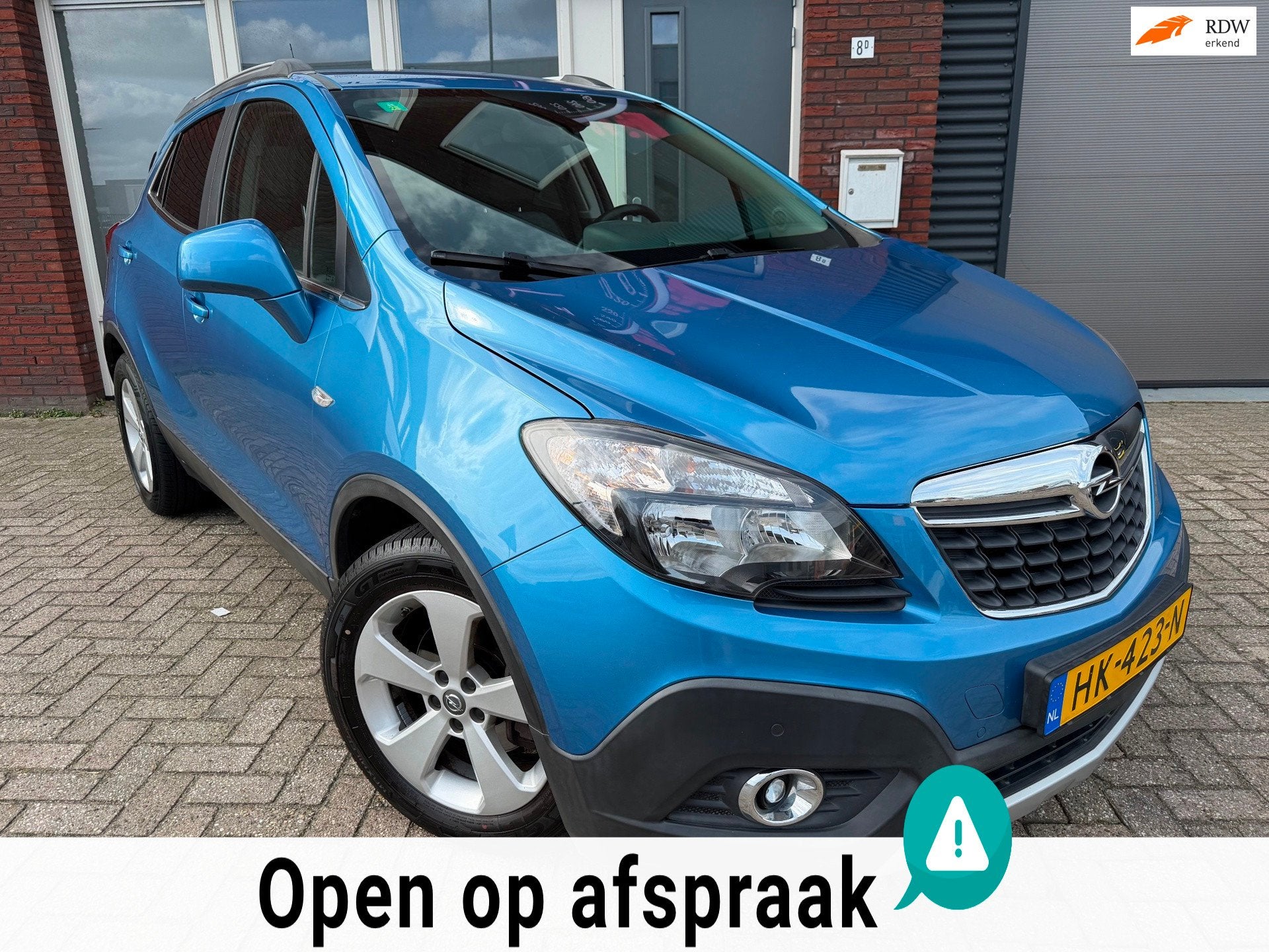 Opel Mokka 1.4 T Cosmo / Camera / Leder / Navi / PDC / NAP, Auto's, Voorwielaandrijving, Gebruikt, 4 cilinders, Met garantie (alle)