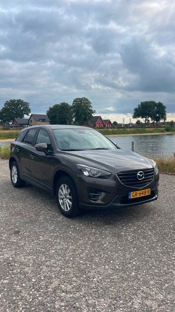 Mazda CX-5 2.0 Skyactiv-g 165pk 2WD Aut 2015 Bruin, Dealer onderhouden, Zwart, 4 cilinders, Leder en Stof