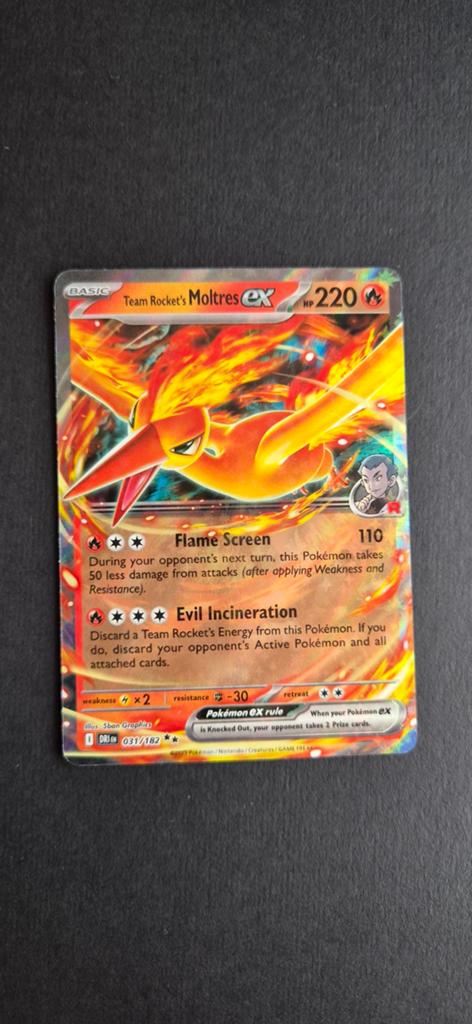 Team Rocket's Moltres ex (DRI 031) Pokémon Kaart, Ophalen of Verzenden, Zo goed als nieuw, Losse kaart, Foil