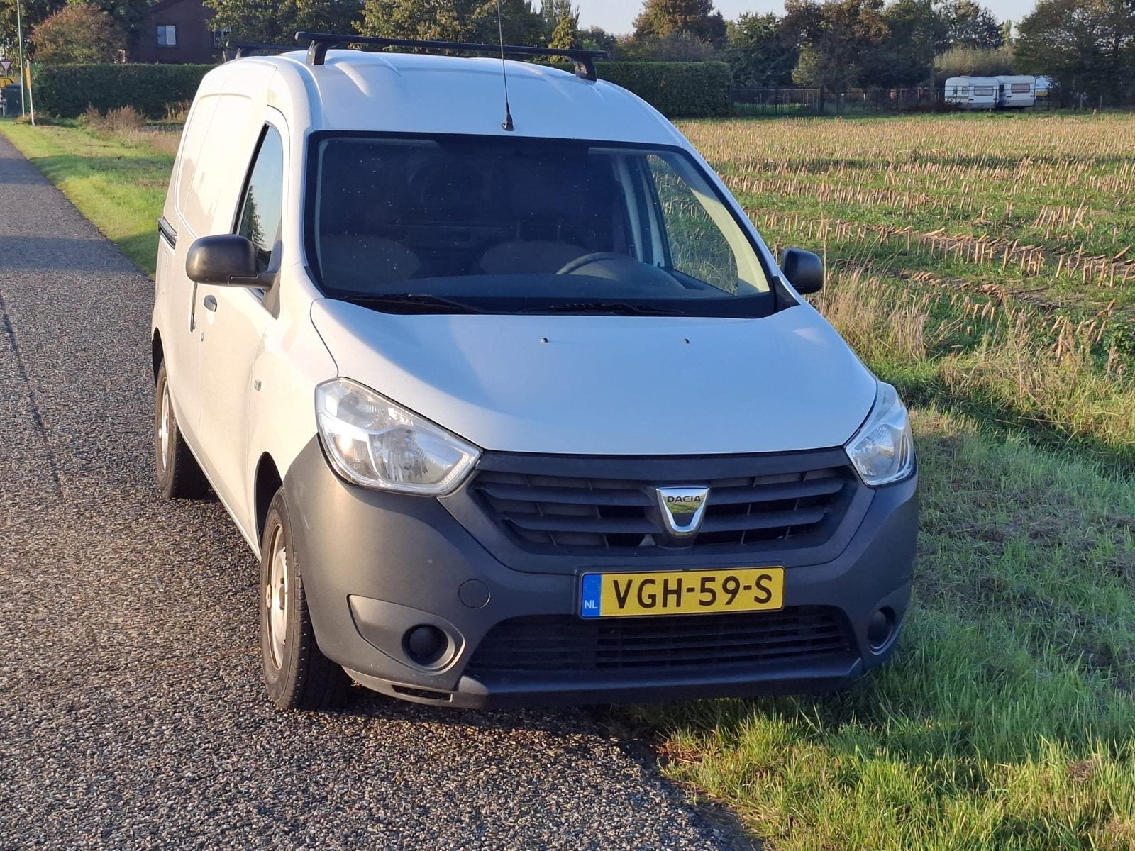 Dacia Dokker Van 1.6 MPI 85pk 2014 Wit, Auto's, 83 pk, 4 cilinders, Wit, 14 km/l
