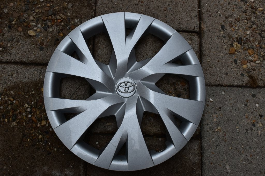 1 losse originele wieldop Toyota Yaris 15 inch (Model 2), Auto diversen, Wieldoppen, Ophalen of Verzenden, Gebruikt