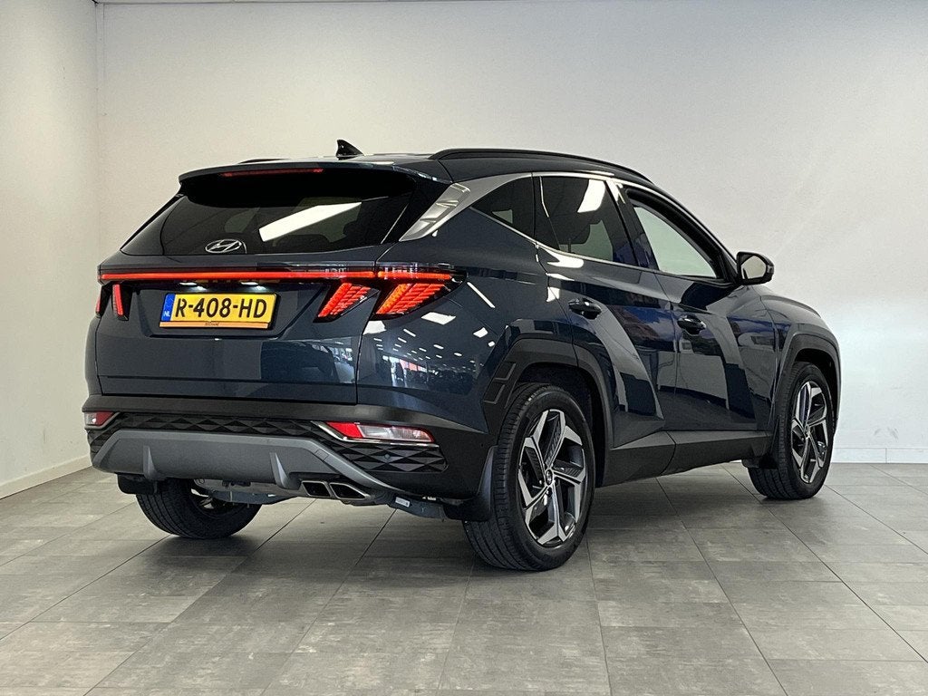Hyundai Tucson 1.6 T-GDI HEV Premium LEDER | NAVI | LED | 36, Auto's, Hyundai, Gebruikt, Euro 6, Blauw, 1650 kg