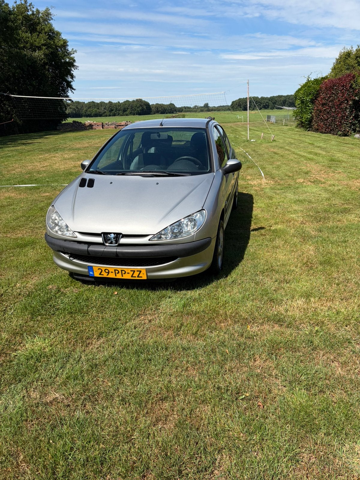 Peugeot 206 1.4 5D 2004 Grijs, Auto's, Voorwielaandrijving, 31 €/maand, 4 cilinders, Origineel Nederlands