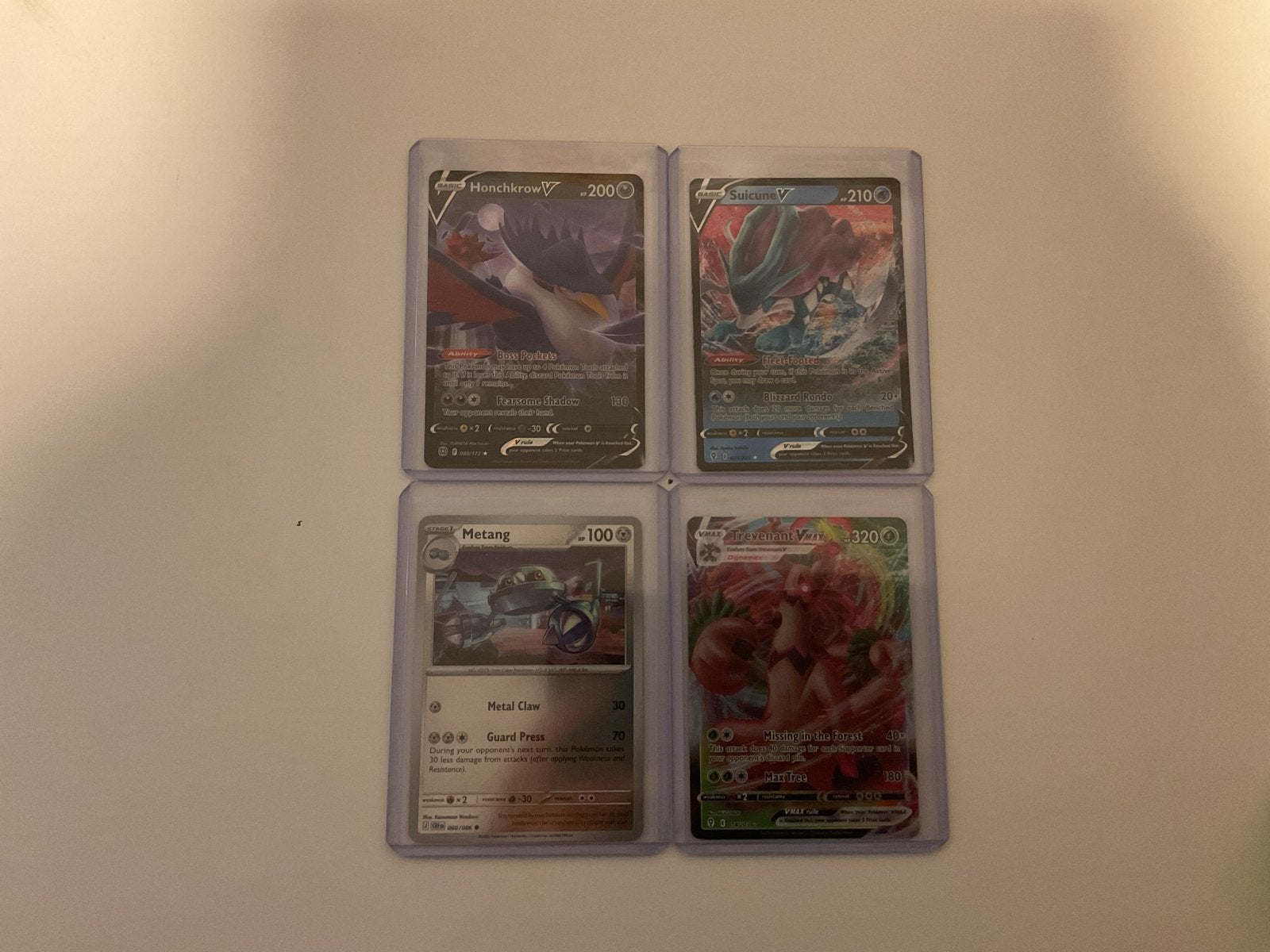 Pokémon Kaarten: Honchkrow V, Suicune V, Metang, Trevenant V, Ophalen of Verzenden, Zo goed als nieuw, Meerdere kaarten