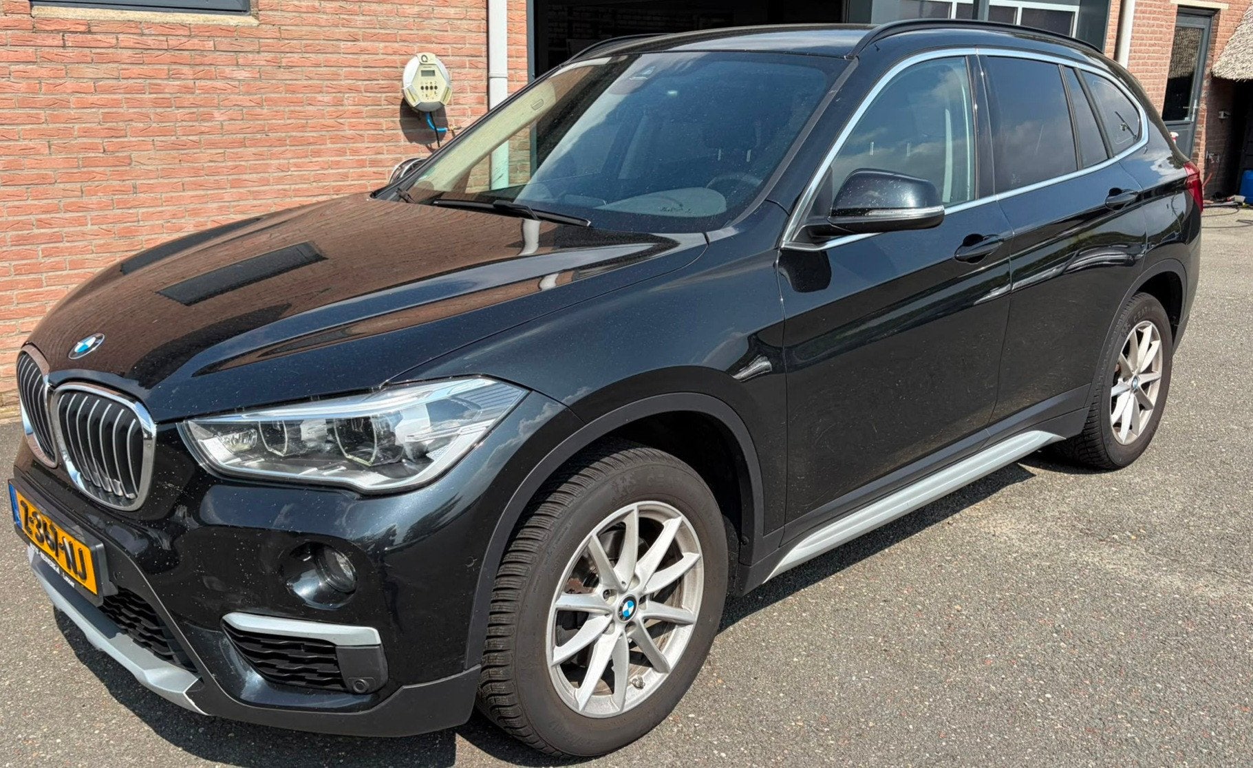 BMW X1 SDrive18d High Executive Sportleder Navi, Auto's, Euro 6, 4 cilinders, 150 pk, Zwart