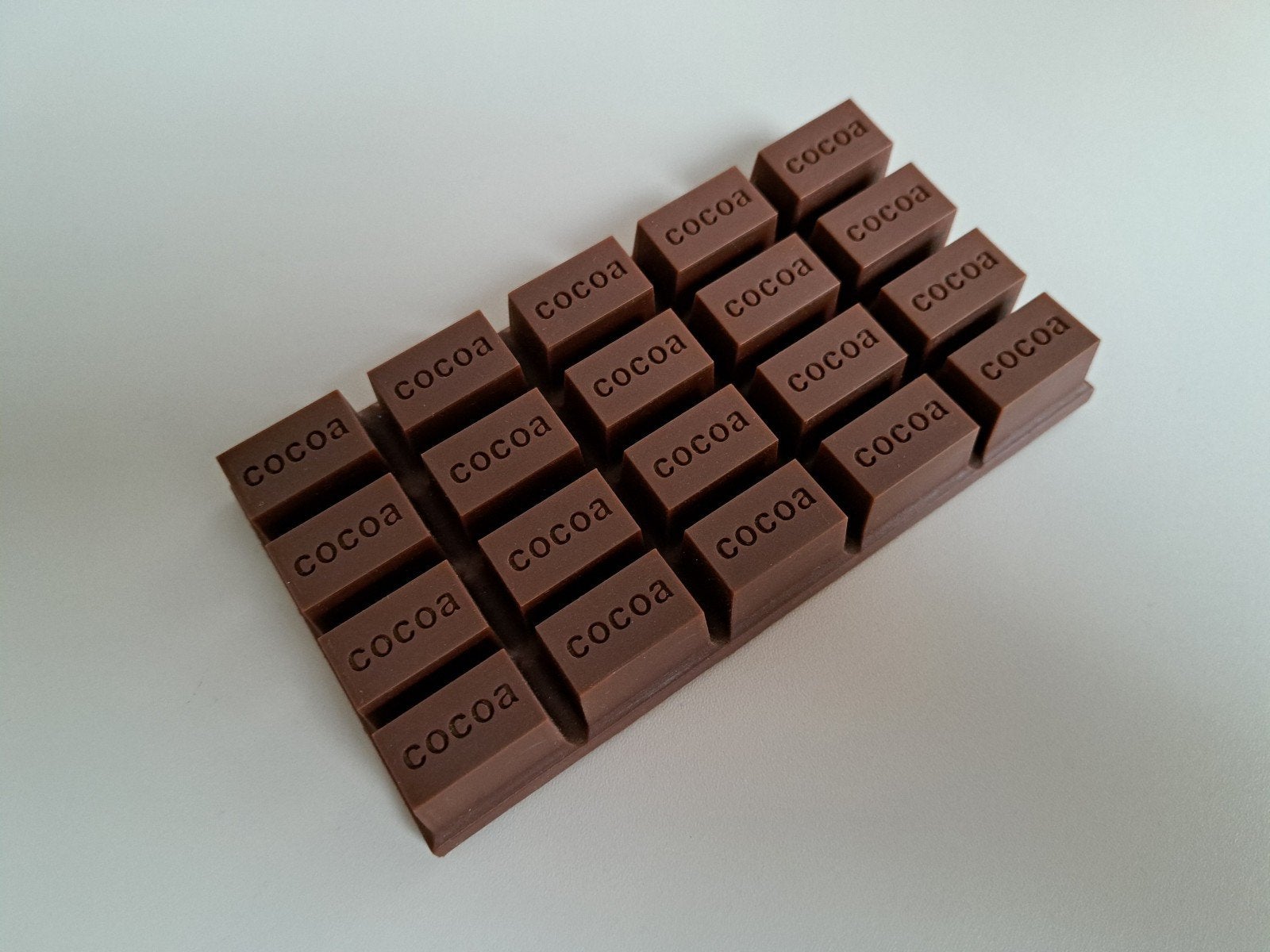 Kunststof chocolade/cacao blok, design gadget, kaartenhouder, Object, Ophalen of Verzenden, Kunststof, Beweegbaar