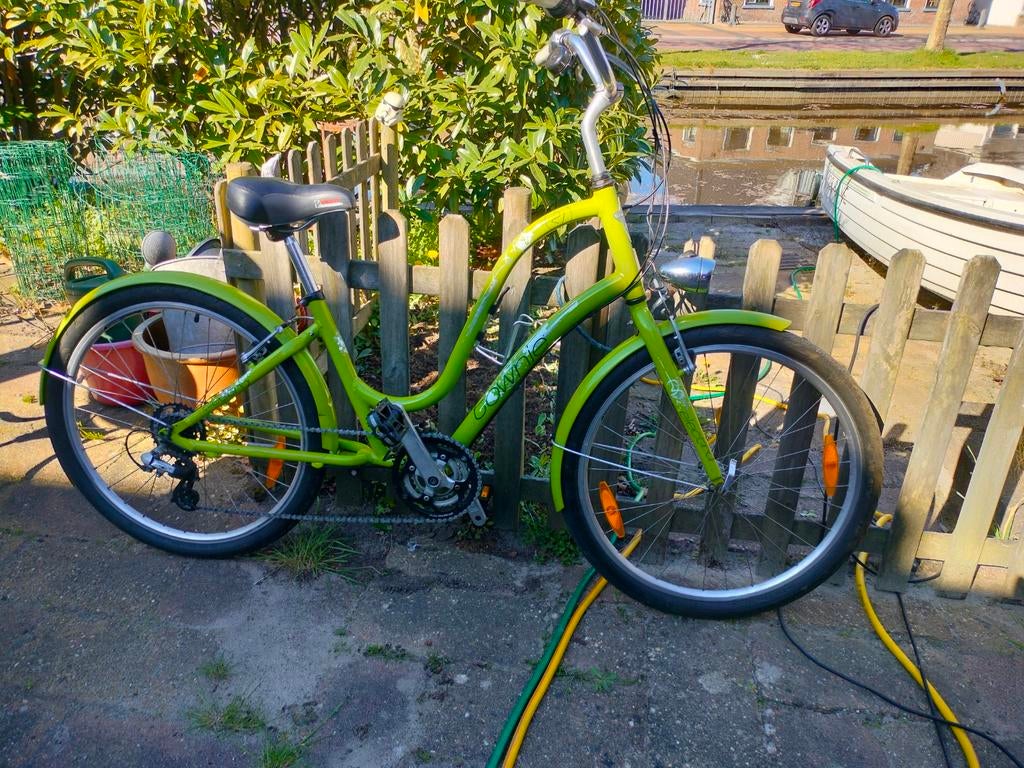 Groene Electra townie met 21 versnellingen., Fietsen en Brommers, Fietsen | Cruisers en Lowriders, Gebruikt, Staal, Velgrem, Ophalen