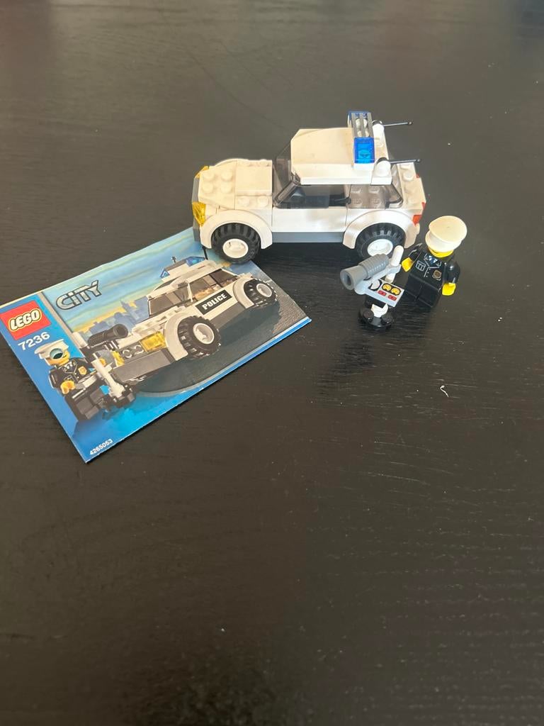 Lego City Politieauto (Set 7236) met minifiguur, Kinderen en Baby's, Speelgoed | Duplo en Lego, Lego, Ophalen of Verzenden, Compleet