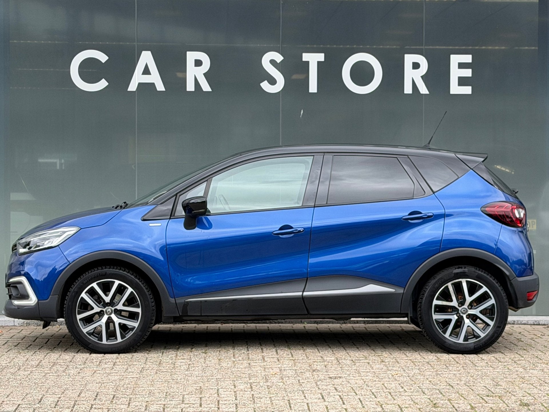 Renault Captur 1.3 TCe Version S Automaat/Cruise/LED/Navigat, Auto's, Gebruikt, 4 cilinders, 150 pk, Blauw