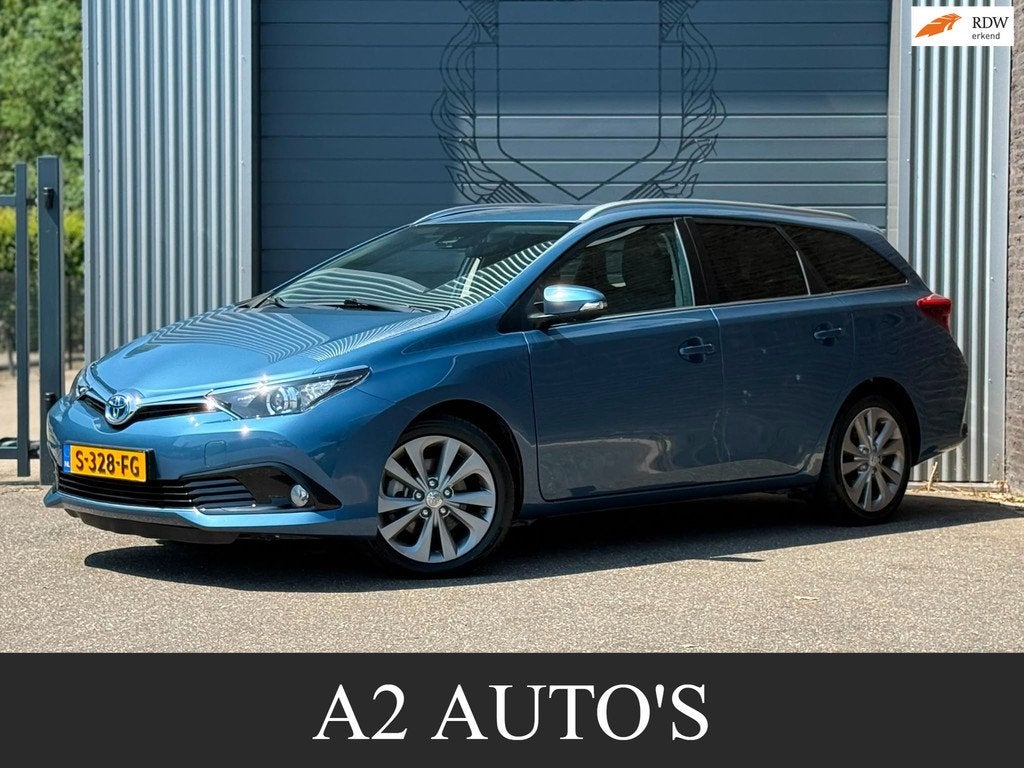 Toyota Auris Touring Sports 1.8 Hybrid Business Pro Automaat, Auto's, Toyota, Gebruikt, Euro 6, Blauw, Automatische klimaatregeling