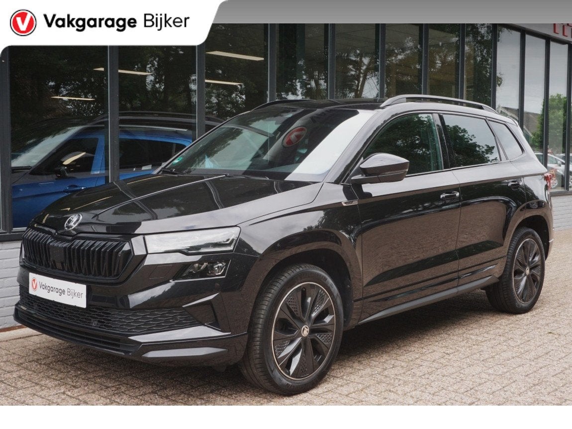 Skoda Karoq 1.5 TSI ACT Sportline Business Camera/Navi/App-C, Auto's, 12 maanden, Stof, 4 cilinders, Automatische klimaatregeling