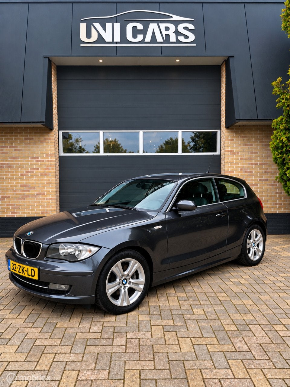 BMW 1-serie 120i High Executive|Automaat|Navi|Cruis|LM|170PK, Auto's, 4 cilinders, 4 stoelen, 170 pk, Euro 4