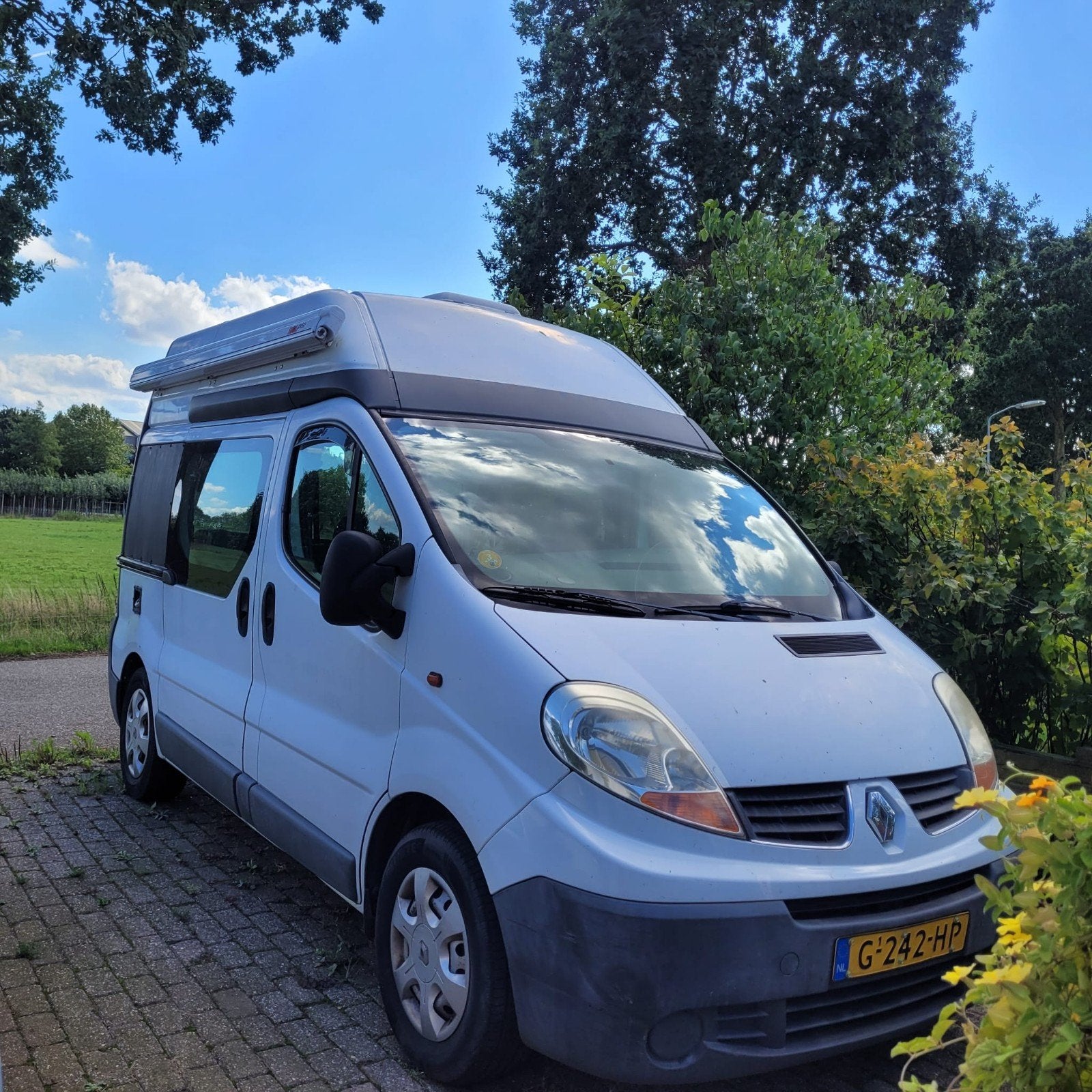 Renault Trafic Camper - 2006 - Verhoogd dak - 1,90 m, Caravans en Kamperen, Overige merken, Buscamper of Camperbus, Tot en met 2