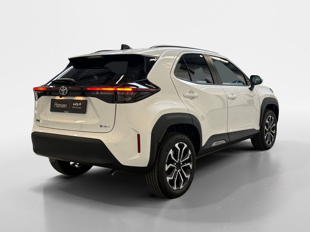 Toyota Yaris Cross 1.5 Hybrid 130 Dynamic I Direct leverbaar, Auto's, Toyota, Gebruikt, Wit, 1490 cc, Bedrijf