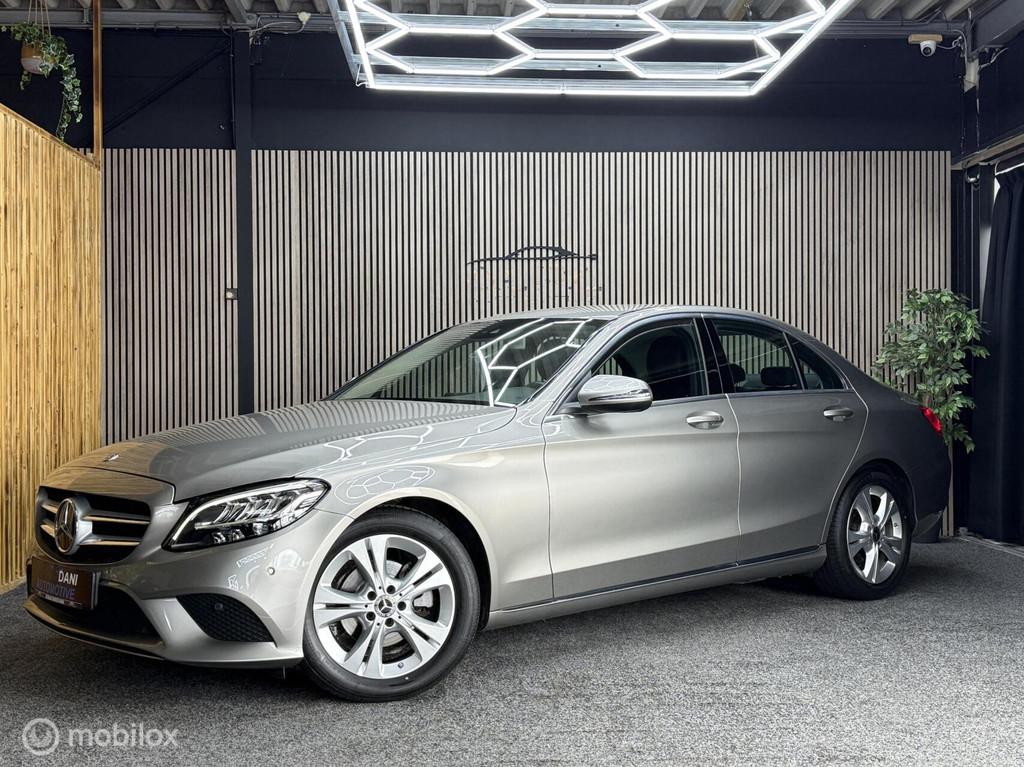 Mercedes C-klasse 180 Advantage Pack|Navi|Pdc|Led|Sfeer|Leer, Auto's, Achterwielaandrijving, Gebruikt, Zwart, Leder en Stof