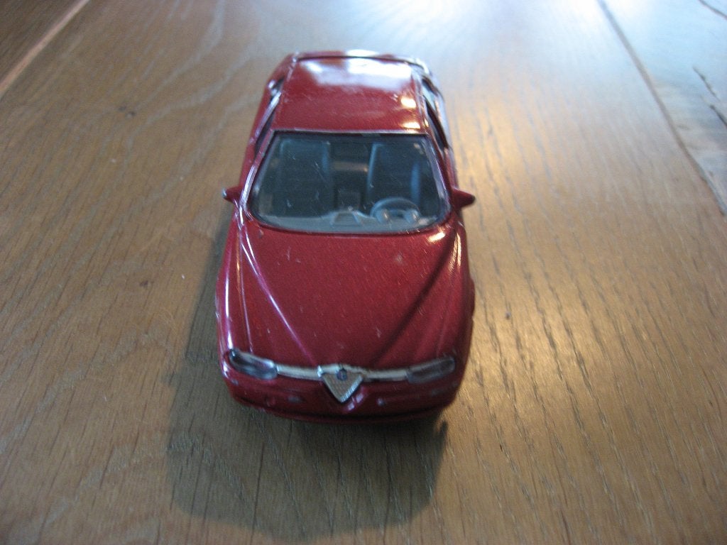 rode Alfa Romeo 156 1/43 van Bburago, Verzenden, Zo goed als nieuw, Auto, Overige merken