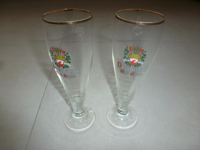 NIEUW 2 mooie taps toelopende bierglazen DOMMELSCH oud bruin, Ophalen of Verzenden, Nieuw, Glas of Glazen, Dommelsch
