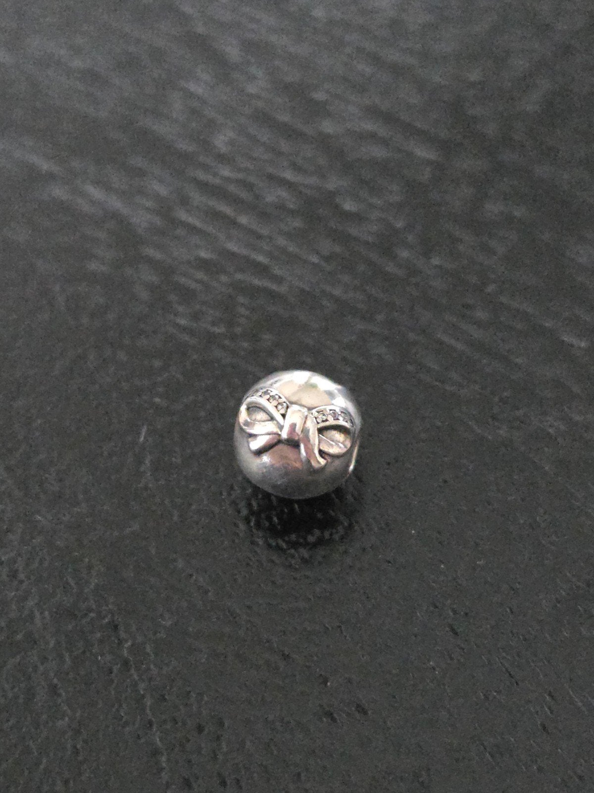 Padora clipje strikje, Ophalen of Verzenden, Zo goed als nieuw, Zilver, Pandora