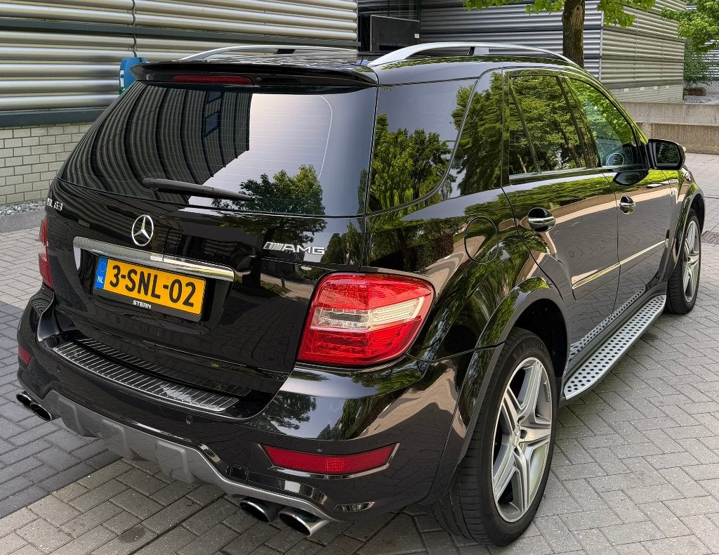 Mercedes Benz ML 63 AMG 10th Anniversary Edi. Volledig OH, Auto's, Mercedes-Benz, Automaat, Zwart, Leder, Vierwielaandrijving