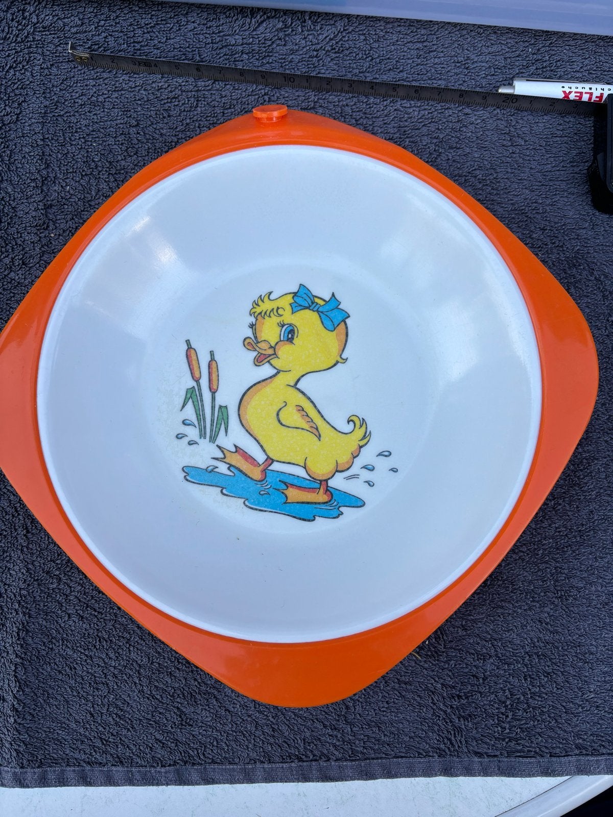 Vintage kinderwarmhoud bordje met eendje - Oranje, Ophalen of Verzenden, Gebruikt
